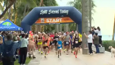 Over a thousand runners take part in AvMed Orange Bowl Beach run in South Beach